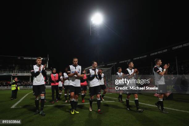 The Hereford players applaud the home supporters after their 0-2 defeat during the Emirates FA Cup second round replay match between Hereford FC and...