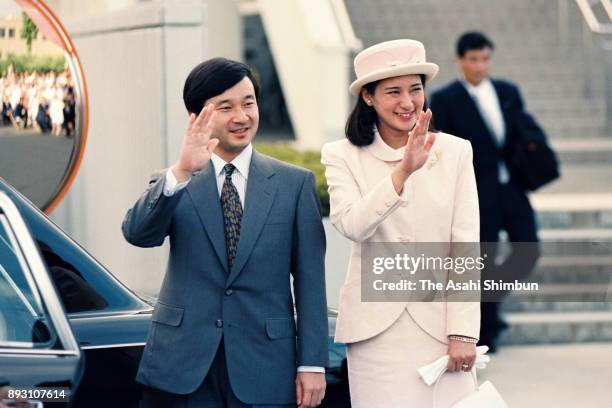 Crown Prince Naruhito and Crown Princess Masako wave to well-wishers after visiting the Iwate Prefecture Red Cross Blood Center on July 13, 1993 in...