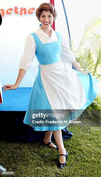 Belle from Beauty and the Beast attends The Walt Disney Company's donation of one million books to First Book, a non profit organization dedicated to...