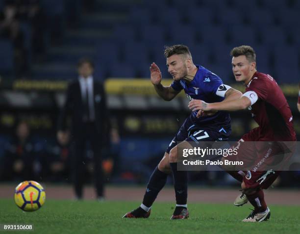 Ciro Immobile of SS Lazio competes for the ball with Filippo Lora of Cittadella during the TIM Cup match between SS Lazio and Cittadella on December...