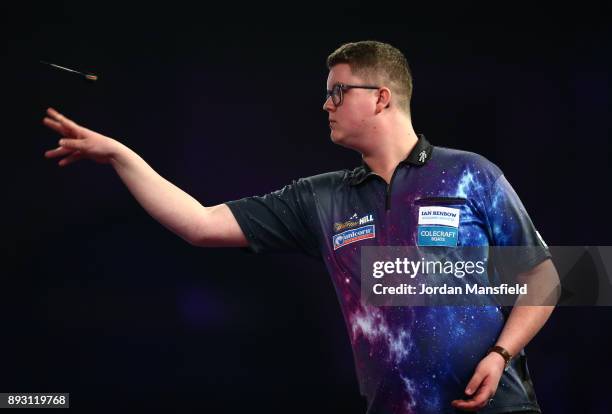 Ted Evetts of England in action during his first round match against Gerwyn Price of Wales during day one of the 2018 William Hill PDC World Darts...