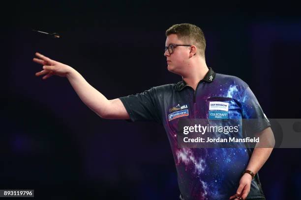 Ted Evetts of England in action during his first round match against Gerwyn Price of Wales during day one of the 2018 William Hill PDC World Darts...