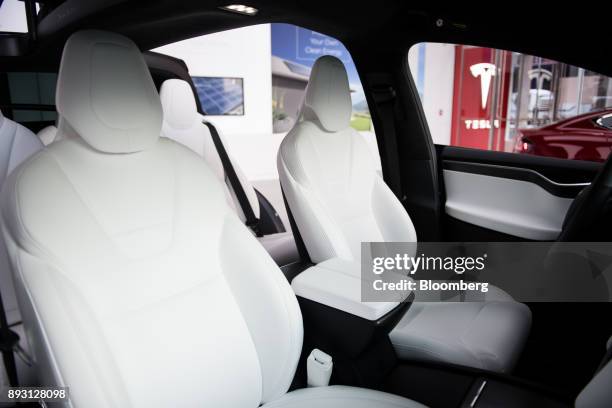 The interior of a Tesla Inc. Model X P100D sports utility vehicle is seen at the company's new showroom in New York, U.S., on Thursday, Dec. 14,...