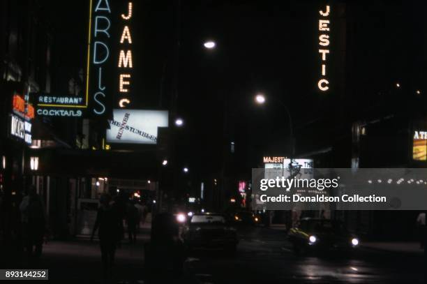 View of the exterior of Sardi's Restaurant at 234 West 44th Street, The Majestic Theatre marquee for 'The Wiz and the St. James Theatre marquee for...