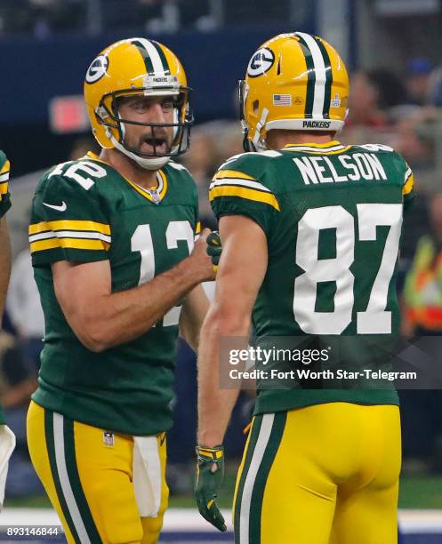 Green Bay Packers quarterback Aaron Rodgers and wide receiver Jordy Nelson after Nelson's fourth-quarter touchdown pass reception against the Dallas...