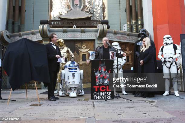Todd Fisher unveils a commemorative plaque in honor of his sister Carrie Fisher for the opening day of "Star Wars: The Last Jedi" at TCL Chinese...