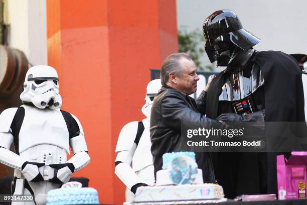 Todd Fisher unveils a commemorative plaque in honor of his sister Carrie Fisher for the opening day of "Star Wars: The Last Jedi" at TCL Chinese...