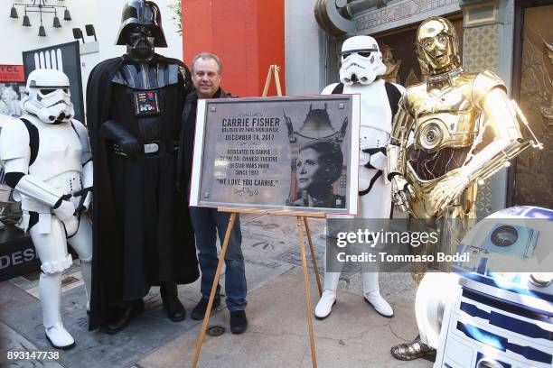 Todd Fisher unveils a commemorative plaque in honor of his sister Carrie Fisher for the opening day of "Star Wars: The Last Jedi" at TCL Chinese...
