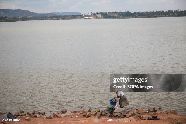 Woman washes clothes in Antananarivo. Madagascar is suffering from its worst plague outbreak in at least 50 years.