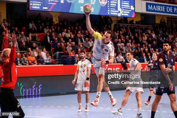 Dominik Klein of HBC Nantes is shooting the ball against Thierry Omeyer of Paris Saint Germain during the Coupe de la Ligue Quarter Final match...