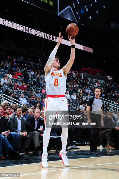 Luke Babbitt of the Atlanta Hawks shoots the ball against the Detroit Pistons on December 14, 2017 at Philips Arena in Atlanta, Georgia. NOTE TO...