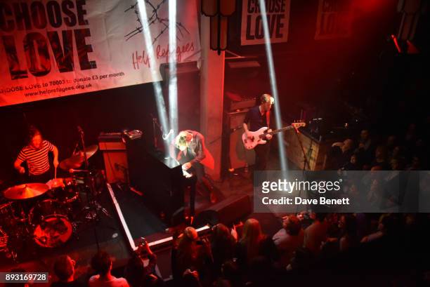 Tom Odell performs for Help Refugees at their annual Christmas party at The Jazz Cafe on December 14, 2017 in London, England.