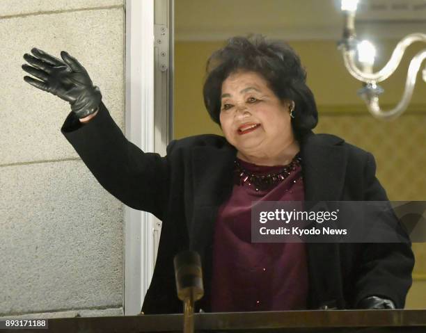 Setsuko Thurlow, a survivor of the 1945 U.S. Atomic bombing in Hiroshima, waves from the balcony of Grand Hotel, the venue for the Nobel Banquet,...