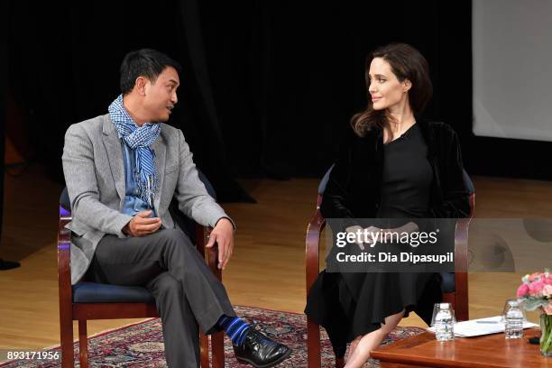 Phloeun Prim and Angelina Jolie attend the "Light After Darkness: Memory, Resilience and Renewal in Cambodia" discussion at Asia Society on December...