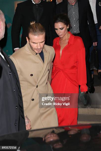 David and Victoria Beckham attend the Victoria Beckham Christmas Open House hosted by Victoria Beckham, David Beckham and British Vogue at Victoria...