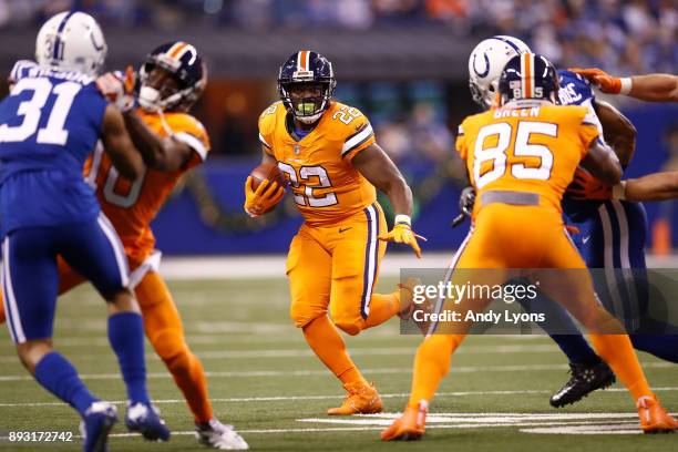 Anderson of the Denver Broncos runs with the ball against the Indianapolis Colts during the first half at Lucas Oil Stadium on December 14, 2017 in...
