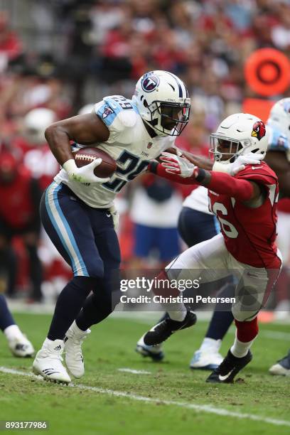 Running back DeMarco Murray of the Tennessee Titans rushes the football against the Arizona Cardinals during the NFL game at the University of...