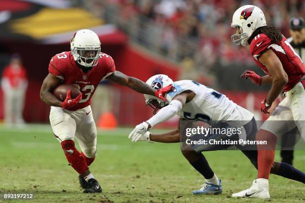 Running back Kerwynn Williams of the Arizona Cardinals rushes the football against the Tennessee Titans during the NFL game at the University of...