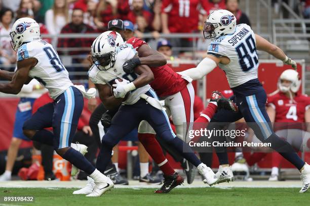 Running back DeMarco Murray of the Tennessee Titans rushes the football against the Arizona Cardinals during the NFL game at the University of...