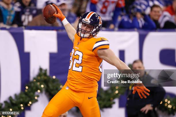 Jeff Heuerman of the Denver Broncos celebrates after a touchdown against the Indianapolis Colts during the second half at Lucas Oil Stadium on...