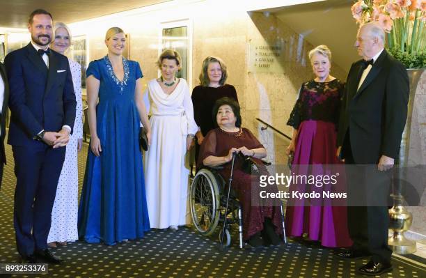 Hiroshima atomic bombing survivor Setsuko Thurlow and other guests pose for a photo on their way to the Nobel Banquet following the Nobel Peace Prize...