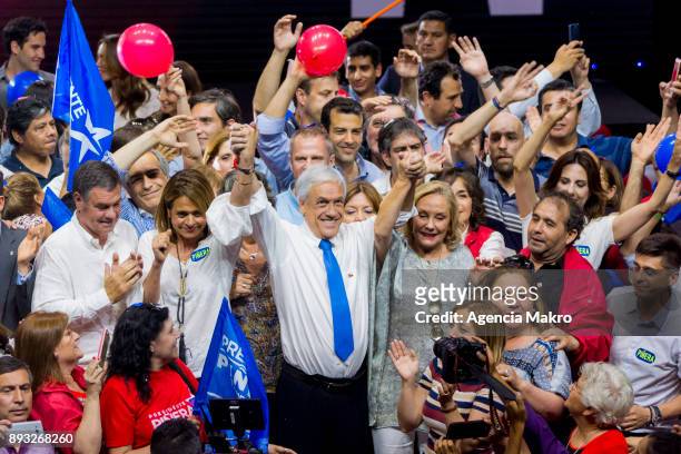 Presidential candidate Sebastian Piñera , celebrates with political allies during the closing rally of the campaign in the Caupolicán Theater, on...