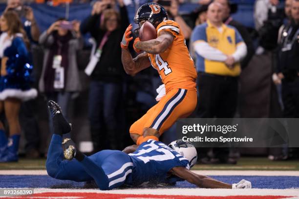 Denver Broncos wide receiver Cody Latimer catches a 22 yard touchdown pass over Indianapolis Colts cornerback D.J. White during the NFL game between...