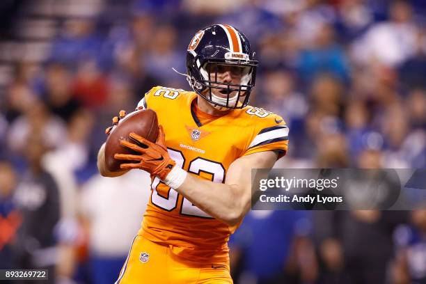 Jeff Heuerman of the Denver Broncos makes a catch and runs for a touchdown against the Indianapolis Colts during the second half at Lucas Oil Stadium...