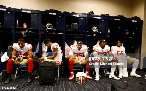 Waun Williams, Dontae Johnson, Eric Reid, Eli Harold and Reuben Foster of the San Francisco 49ers relax in the locker room prior to the game against...