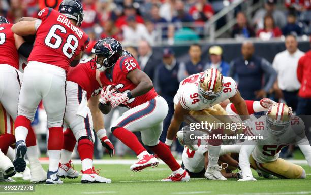 Lamar Miller of the Houston Texans rushes during the game against the San Francisco 49ers at NRG Stadium on December 10, 2017 in Houston, Texas. The...