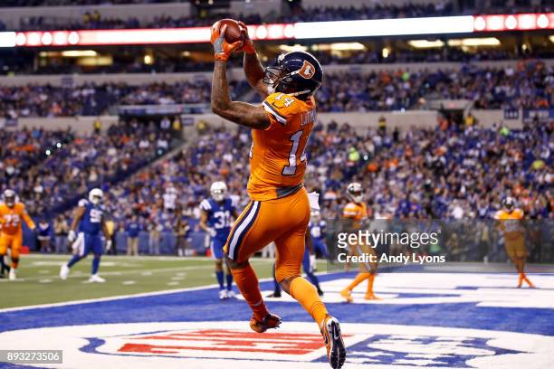 Cody Latimer of the Denver Broncos catches a pass on a two-point conversion against the Indianapolis Colts during the second half at Lucas Oil...