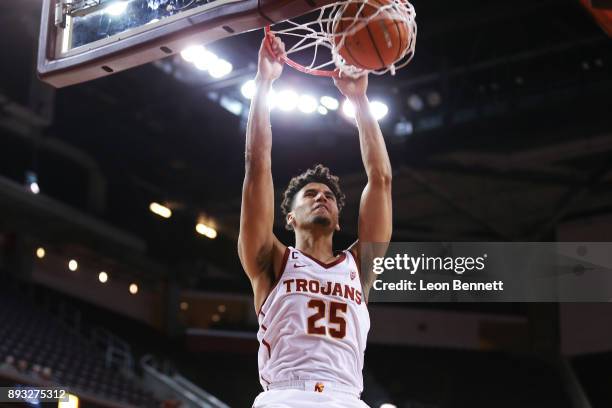 Bennie Boatwright of the USC Trojans dunks the ball against the Santa Clara Broncos during a college basketball game at Galen Center on December 14,...