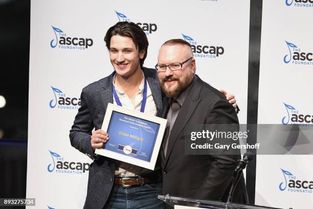 Recipient of the Desmond Child Anthem Award, Drake Milligan accepts from Desmond Child during the ASCAP Foundation Awards 2017 at Jazz at Lincoln...