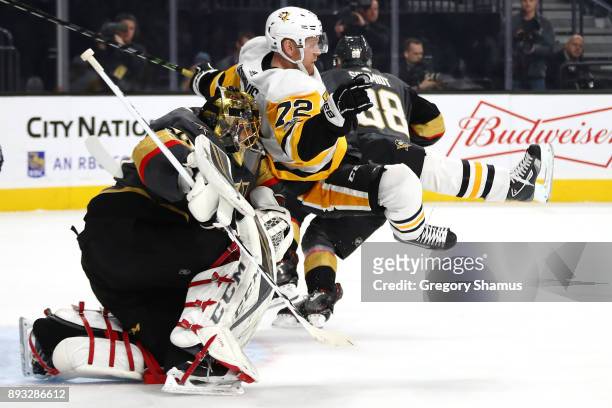 Marc-Andre Fleury of the Vegas Golden Knights takes down Patric Hornqvist of the Pittsburgh Penguins during the first period at T-Mobile Arena on...