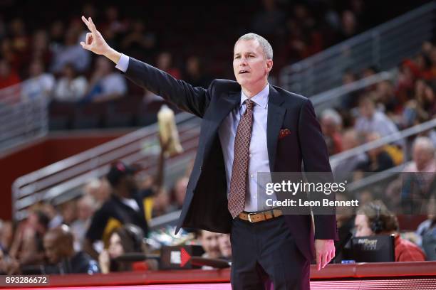 Andy Enfield Head coach of the USC Trojans directs his team against the Santa Clara Broncos during a college basketball game at Galen Center on...