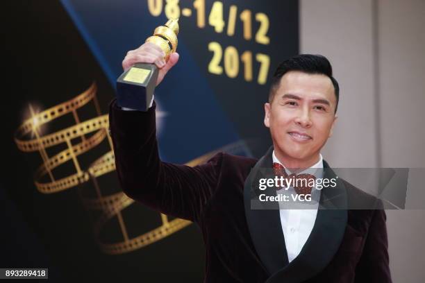 Actor Donnie Yen, winner of International Star of The Year, poses during the award ceremony for the 2nd International Film Festival & Awards Macao on...