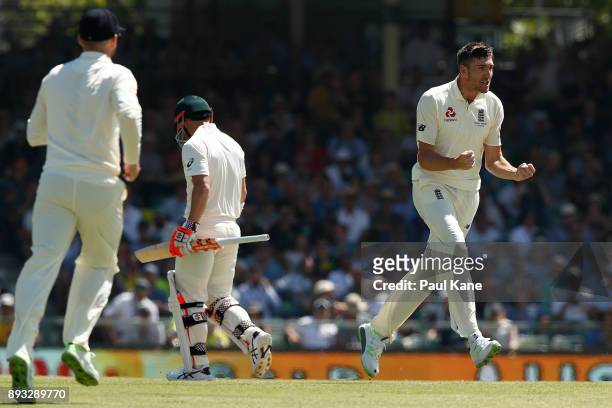 Craig Overton of England celebrates the wicket of David Warner of Australia during day two of the Third Test match during the 2017/18 Ashes Series...