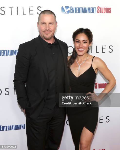 Christian Bale and Q'Orianka Kilcher attend the Premiere Of Entertainment Studios Motion Pictures' "Hostiles" at Samuel Goldwyn Theater on December...