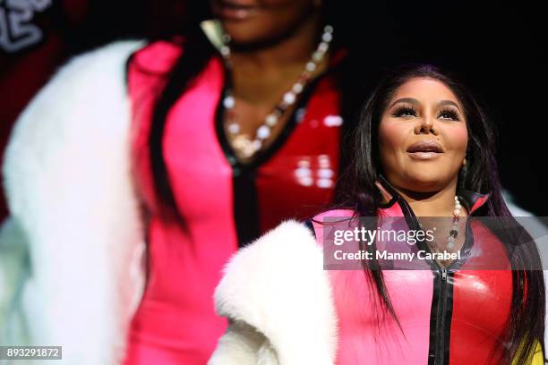 Lil Kim performs onstage at the 2017 Hot for the Holidays concert at Prudential Center on December 14, 2017 in Newark, New Jersey.