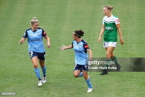 Remy Siemsen of Sydney FC congratulates Lisa De Vanna of Sydney FC as she celebrates scoring a goal during the round eight W-League match between...