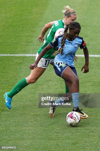 Elise Thorsnes of Canberra United and Princess Ibini-Isei of Sydney FC compete for the ball during the round eight W-League match between Sydney FC...