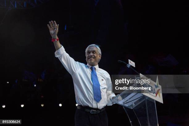 Chile's Former President Sebastian Pinera, presidential candidate for the National Renewal party, greets his supporters during a final campaign event...