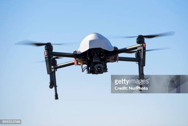 Drone flies during a media demonstration by the Los Angeles Fire Department in Los Angeles, California on December 14, 2017. The LAFD deployed DJIs...