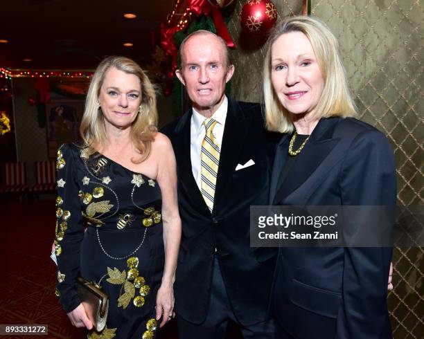 Debbie Bancroft, Mark Gilbertson and Anne Eisenhower attend A Christmas Cheer Holiday Party 2017 Hosted by George Farias and Anne and Jay McInerney...