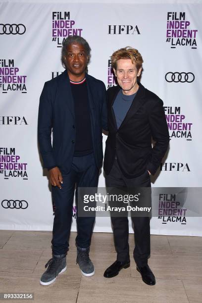 Elvis Mitchell and Willem Dafoe attend Film Independent at LACMA presents an evening with Willem Dafoe at Bing Theater At LACMA on December 14, 2017...