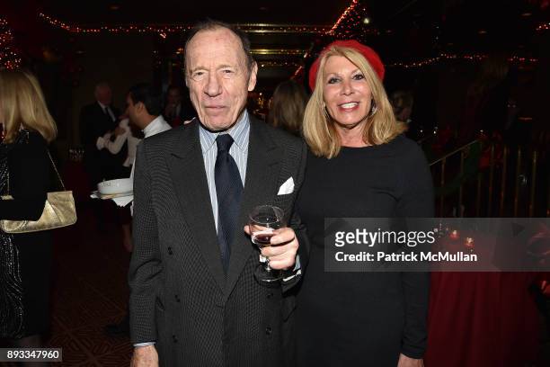 Anthony Haden-Guest and Dottie Herman attend A Christmas Cheer Holiday Party 2017 Hosted by George Farias, Anne and Jay McInerney at The Doubles Club...
