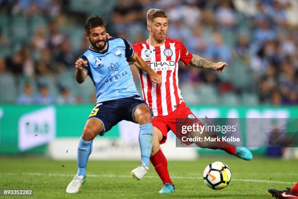 Michael Zullo of Sydney FC tries to stop the shot from Luke Brattan of City FC as he scores a goal during the round 11 A-League match between Sydney...