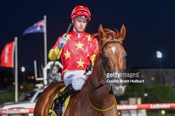 Fred Kersley returns to the mounting yard on Pirapala after winning the IGA Supermarkets Handicap at Moonee Valley Racecourse on December 15, 2017 in...