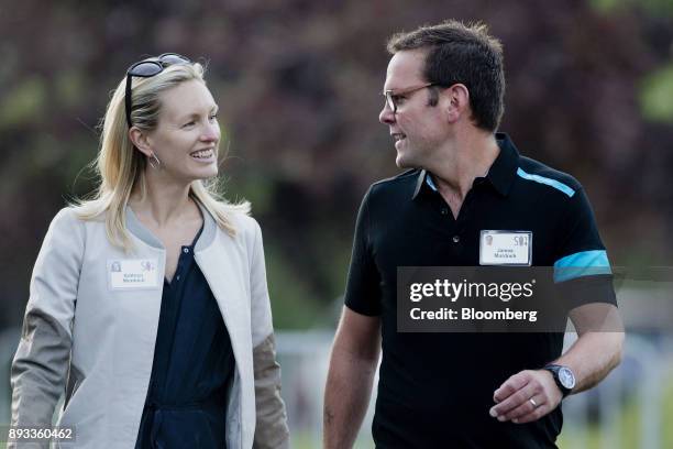 James Murdoch, co-chief operating officer of News Corp., walks with Kathryn Murdoch while arriving for a morning session during the Allen & Co. Media...