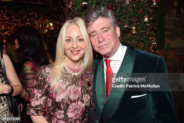 Dana Hammond Stubgen and Jay McInerney attend A Christmas Cheer Holiday Party 2017 Hosted by George Farias, Anne and Jay McInerney at The Doubles...